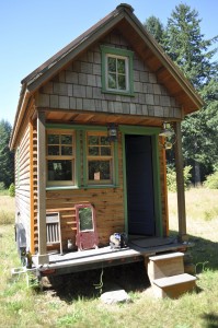 Photo of a tiny house. Is less more or less or does it depend?