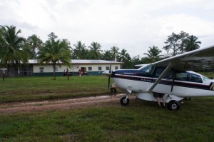 Photo of Rus Rus Hospital and the Cessna 206 that is used as the Air Ambulance
