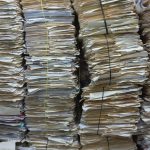 Photo of stacks of archived patient files