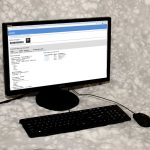 Image of piClinic Console prototype which consists of a monitor, keyboard, and mouse